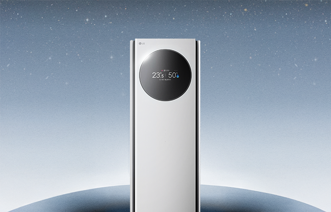 별무리가 반짝이는 채도가 어두운 푸른 하늘 배경으로 휘센 에어컨 타워형이 서있는 이미지